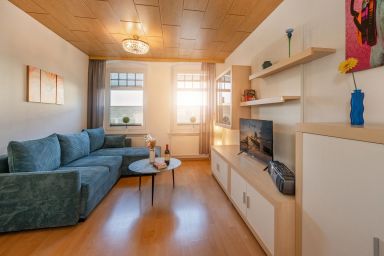 Villa Linde - Moderne Ferienwohnung mit Terrasse – nur 700 m zum Strand