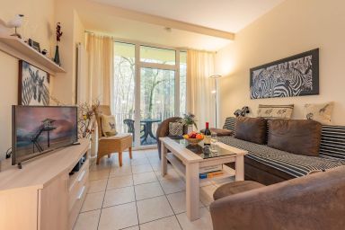 Südwind 21 - Südwind 21 - Urlaub für vier Personen mit Balkon, Sauna und Schwimmbad