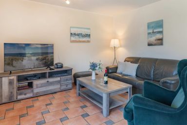 Ferienwohnung Wassermann - Moderne Ferienwohnung mit Terrasse & Garten – Erholung am Achterwasser