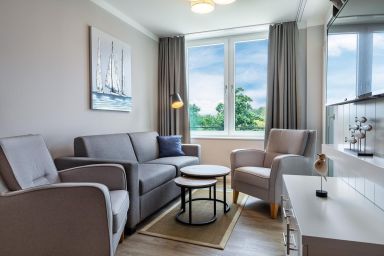 Ferienwohnungen am Godewindpark Travemünde - Stilvolles Apartment  – Erholung in Ostseenähe mit Loggia und exklusivem SPA