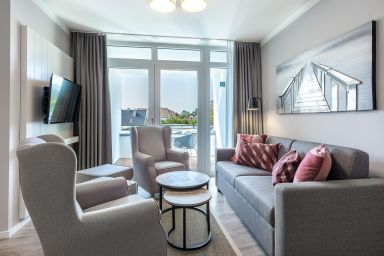 Ferienwohnungen am Godewindpark Travemünde - Großzügiges, sonnendurchflutetes Apartment mit Loggia – ideal für Familien