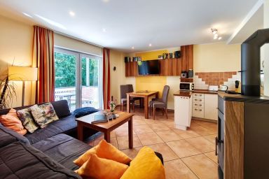 Küstenwaldhaus - Ferienwohnung Pinguin – Wo Natur, Sauna und Meer auf Sie warten
