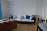 Wohnbereich. Wohnzimmer mit Schlafcouch und Tagesbett
