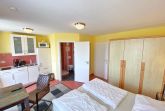 Wohnzimmer mit offener KÃ¼che
