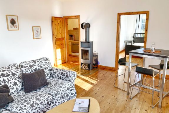 Wohnzimmer mit Schlafsofa