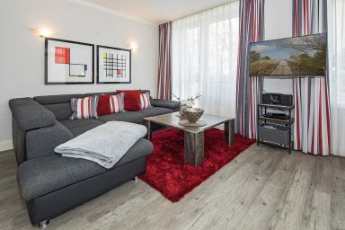 Strand-Park - Moderne Ferienwohnung in erstklassiger Strandlage mit sonnigem Süd-Westbalkon