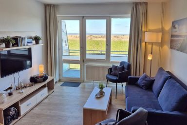 Hus Strandkieker - Tolles Maisonette-Apartment mit Meerblick und Balkon in Deichlage an der Nordsee