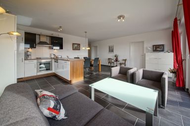 NordseeResort Friesland - Tolles Ferienapartment an der Nordsee mit Südbalkon, Sauna und Whirlbadewanne