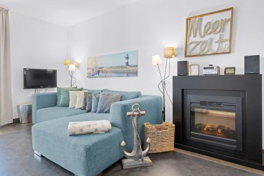 Resort Deichgraf - Strandnahe Ferienwohnung mit Sauna, Strandkorb und Balkon mit Land- & Meerblick