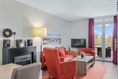 Resort Deichgraf - Ruhige, schöne Wohnung in Strandnähe mit Sauna und Balkon mit Blick ins Grüne