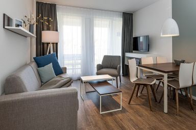 Deichhäuser Anna Küste - Strandnahes Ferienapartment mit Balkonen, Parkplatz, Schwimmbad- & Saunanutzung