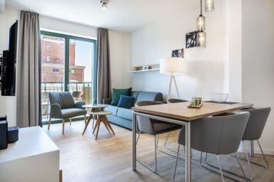 Krusespeicher - Geschmackvolles Apartment mit Balkon, WLAN und Saunanutzung in Toplage im Hafen