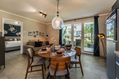 Ferienwohnung Terrasse am Haff - Ruhige Ferienwohnung am Stettiner Haff mit Balkon & Sauna, nah an See & Meer