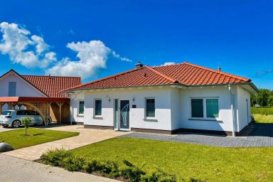 Ferienhaus Windrose - modernes Haus mit Kamin und eigener Sauna sowie Garten - Ferienhaus Windrose