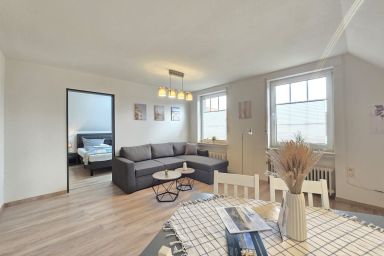 Ferienwohnung Düne 1 Norddeich - Komfortable Ferienwohnung mit Garten und WLAN nahe Sandstrand in Norddeich