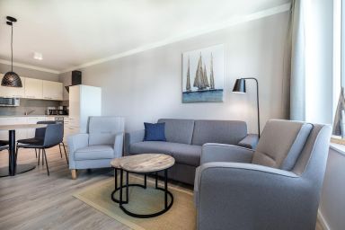 Ferienwohnungen am Godewindpark Travemünde - Stilvolles Apartment am Park mit Hund und eigener E-Ladesäule in der Tiefgarage