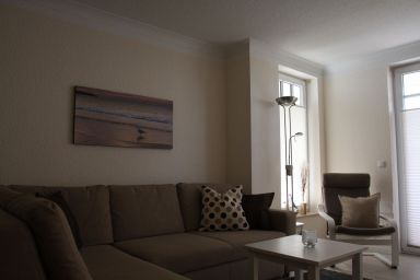 Strandquartett Fewo 11 - Gemütliche 3-Zimmer-Ferienwohnung mit Kamin & Terrasse für bis zu 4 Personen