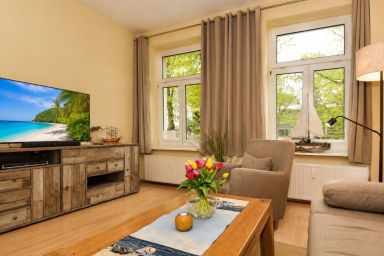Fewo Strandidyll - Gemütliche 52m² Ferienwohnung mit Garten, Balkon & Saison-Strandkorb