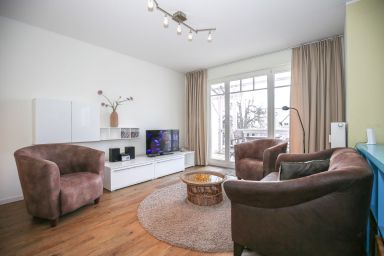 Haus Meeresbrise Fewo 4 - Moderne 3-Zimmer-Ferienwohnung mit Balkon für bis zu 4 Personen, 2 Schlafzimmer