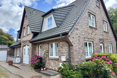 Norderstraße Whg. 1 - Gemütliche Erdgeschoss-Ferienwohnung mit Kamin und Südterrasse in strandnaher Lage