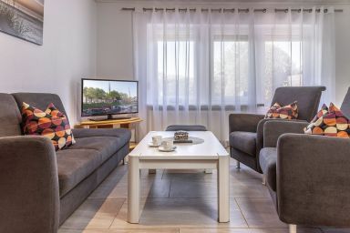50037 Friesendomizil - Einfach mal die Seele baumeln lassen: Der ruhige Standort dieser Ferien-Doppelhaushälfte lädt an lauen Sommertagen zum Relaxen ein.