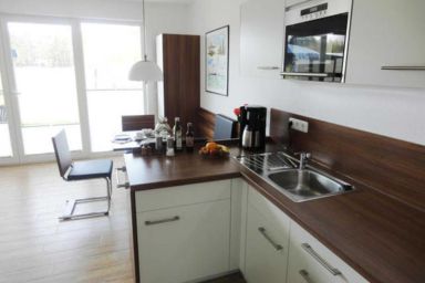 Küstenwald - Ferienwohnung Igelring H