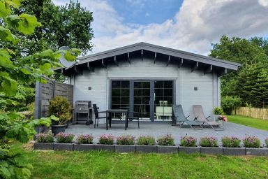 Idyllisches Blockbohlenhaus mit eigenem Garten und Sauna zum Wohlfühlen