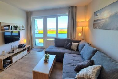 Hus Strandkieker - Tolles Maisonette-Apartment mit Meerblick und Balkon in Deichlage an der Nordsee