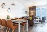 Wohn-/Essbereich mit Zugang zum Balkon