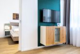 Wohn-/Essbereich mit Flatscreen-TV