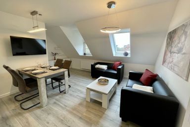 Albatros OG - Modernes 2-Zimmer App. für 4 Pers. mit PKW-Stellplatz, WLAN, Nespresso Maschine.