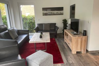 Ruhepol - 130qm Ferienhaus für 6 Personen mit Wintergarten, Garten, Dachterrasse und Kamin