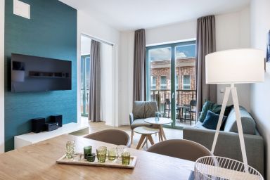 Krusespeicher - Topmodernes 2-Zimmer Apartment mit Balkon und WLAN in erstklassiger Hafenlage