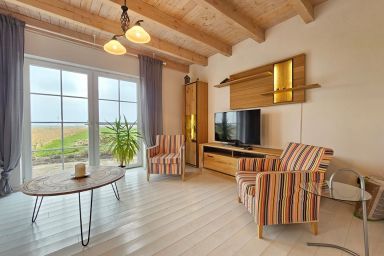 Ferienhaus Lupine Neßmersiel - Ferienhaus Lupine Neßmersiel – Komfortables Haus mit Garten in ländlicher Lage