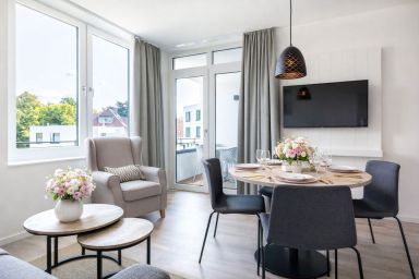 Ferienwohnungen am Godewindpark Travemünde - Modernes Feriendomizil in Travemünde – Balkon, Wellness und Meer in Sicht