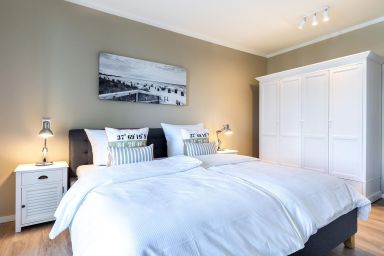 Ferienwohnungen am Godewindpark Travemünde - Modernes Apartment in Strandnähe mit Balkon, Sauna und privatem Parkplatz