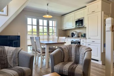 Eidumweg Whg. 4 - Helle und moderne Obergeschosswohnung für 4 Personen mit Balkon und Sauna