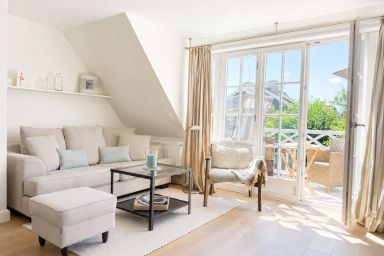 Sünnsiet - Süünsiet: Moderne Ferienwohnung mit sonnigem Südbalkon in Wenningstedt.