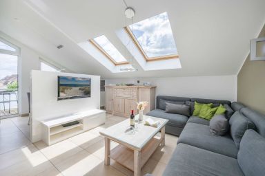 Haus Ostseekristall - Gemütliche Ferienwohnung in Zinnowitz mit Balkon und Kamin nahe Strand & Stadt