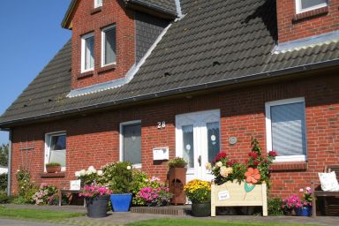 Wohnung in Osterdeich mit Terrasse und Garten