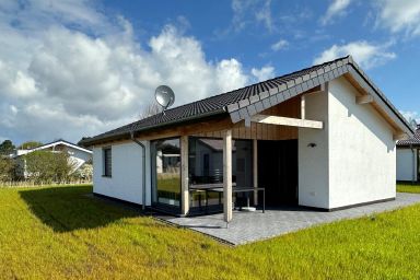 G6 Freistehendes Haus mit Garten und Wallbox