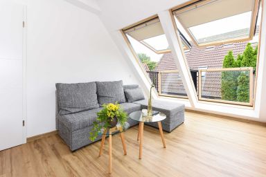 Haus Meeresleuchten in Neuharlingersiel - Ferienwohnung Flut