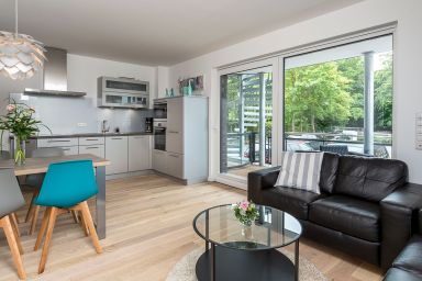 Beach House - Ferienwohnung mit Fahrradkeller, Parkplatz und Terrasse
