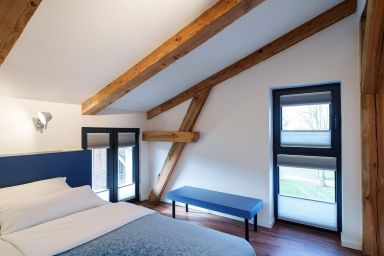 Das Gästehaus - Zimmer - Zimmer 3 Geborgen unterm Giebel