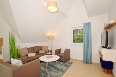 Rex Rugia - strandnahe FeWo mit Balkon, Schwimmbad- und Saunanutzung -  Rex Rugia