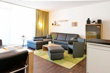 DünenResort Binz - Hochwertiges Familienapartment mit großem Balkon, Whirlbadewanne und Kaminofen