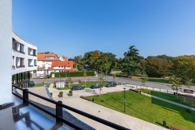 Godewindpark Travemünde - Geschmackvolles Ferienapartment mit Loggia und Blick in den Park in Ostseenähe