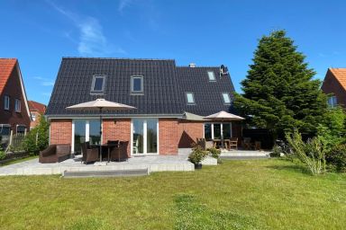 Ferienhaus Deichglück - Familienurlaub am Deich mit 4 Schlafzimmern, großem Garten & Panoramablick