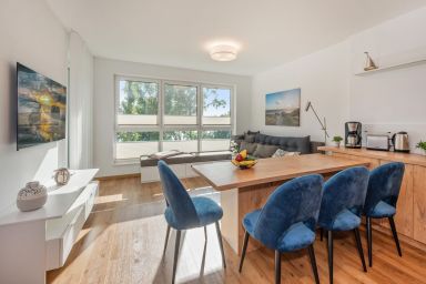 Ferienwohnung Haffblick 8 mit Balkon und Blick auf das Haff - Moderne Ferienwohnung mit Balkon, idyllisch & ruhig im Grünen gelegen