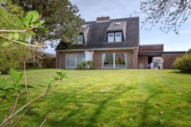 Ferienwohnung Charlie - Idyllische Erdgeschosswohnung mit Garten in zentraler Lage von Wenningstedt